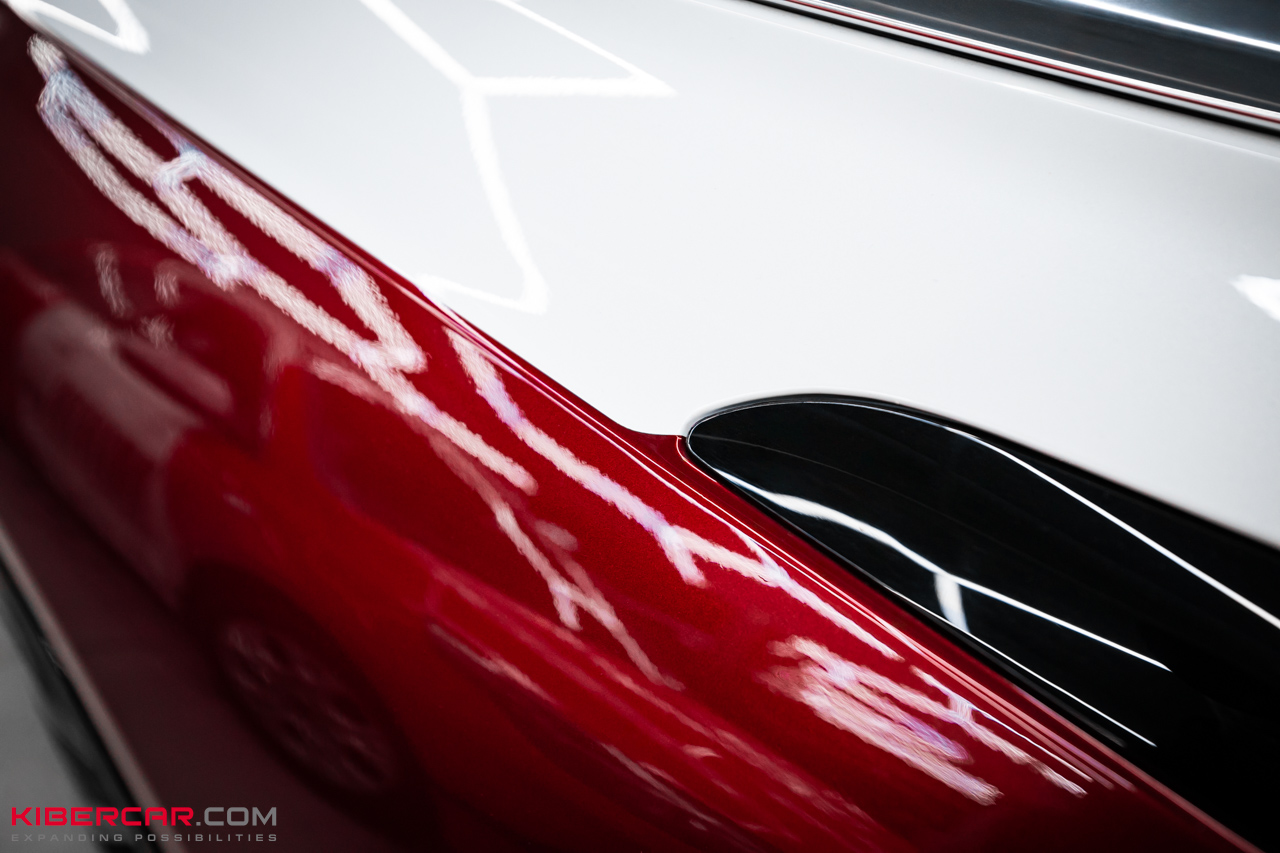 Оклейка цветной полиуретановой пленкой на Hongqi E-HS9: акцент на характер и защита кузова