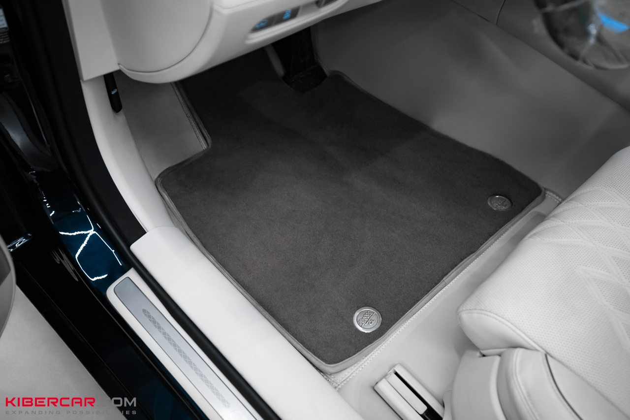 Индивидуальный пошив ковриков для Genesis G90: защита белоснежного салона