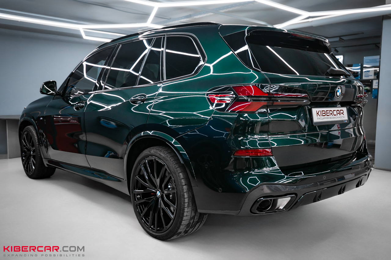 Оклейка BMW X5 глянцевой полиуретановой пленкой